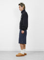 The Striped Beach Short from Stüssy comes in Navy at Couverture & The Garbstore
model side