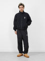 The Nylon Track Pant from Stüssy comes in Black at Couverture & The Garbstore
model front