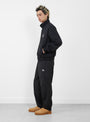 The Nylon Track Pant from Stüssy comes in Black at Couverture & The Garbstore
model side