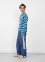 The Striped Sweater from Stüssy comes in Blue at Couverture & The Garbstore
model side