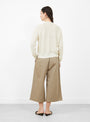The Linen and Cotton Flecked Cardigan from Cordera comes in Cream at Couverture & The Garbstore
model back