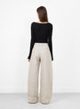The Nantia Trouser from Séfr comes in Austre Beige at Couverture & The Garbstore
model back