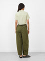 The Striped Cropped Shirt from 7115 by Szeki comes in Mustard at Couverture & The Garbstore
model back