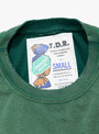 American Waste T-Shirt Green fromt TDR at Couverture & The Garbstore
label