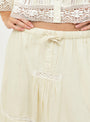 Pippa Solid Midi Skirt Cream Cream Sea (model clsoe up) at Couverture & The Garbstore