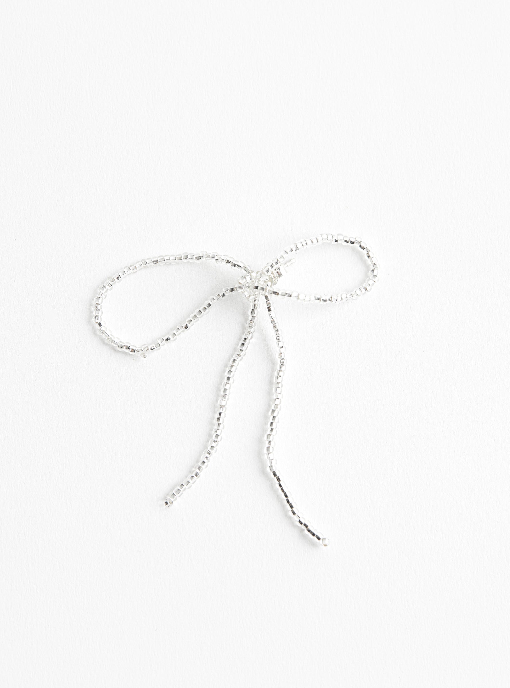 Sad Bow Ear Stick SilverSilverPura Utz (front view) at Couverture & The Garbstore