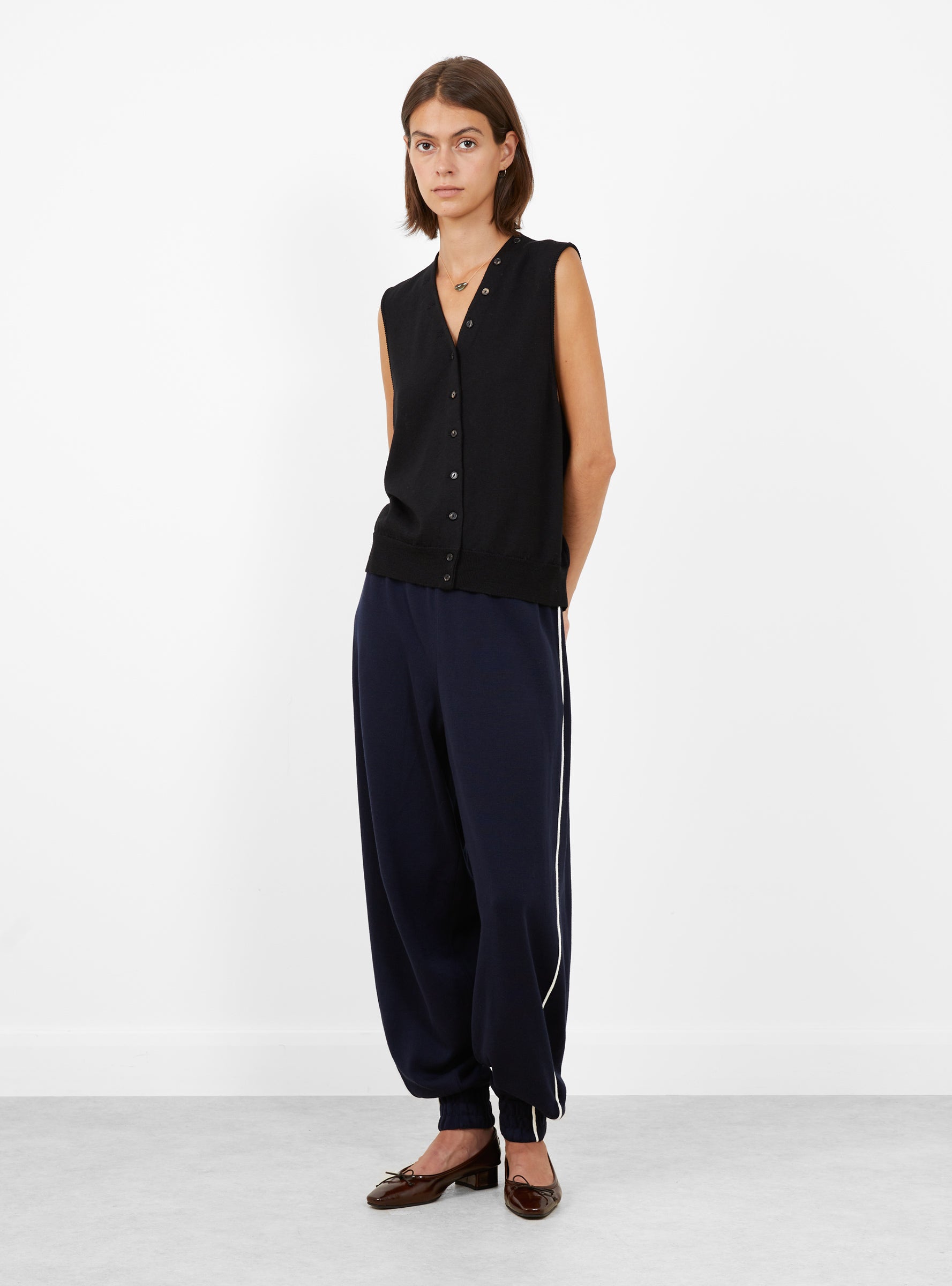 Merino Wool Button Waistcoat Black Black CORDERA (model front) at Couverture & The Garbstore