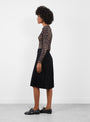 Herringbone Pleated Shorts Black Black TOGA (model side) at Couverture & The Garbstore
