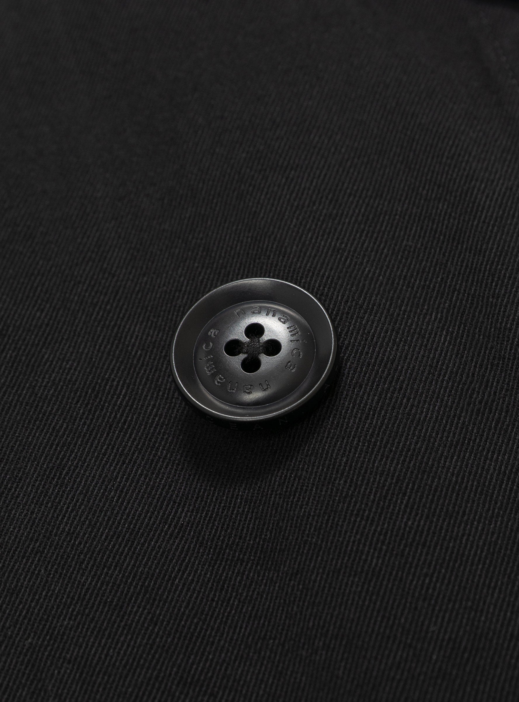 Cotton Codura Balmacaan Coat Black NANAMICA (button detail) at Couverture & The Garbstore