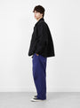 Duxville Jacket Black TDR (model side) at Couverture & The Garbstore