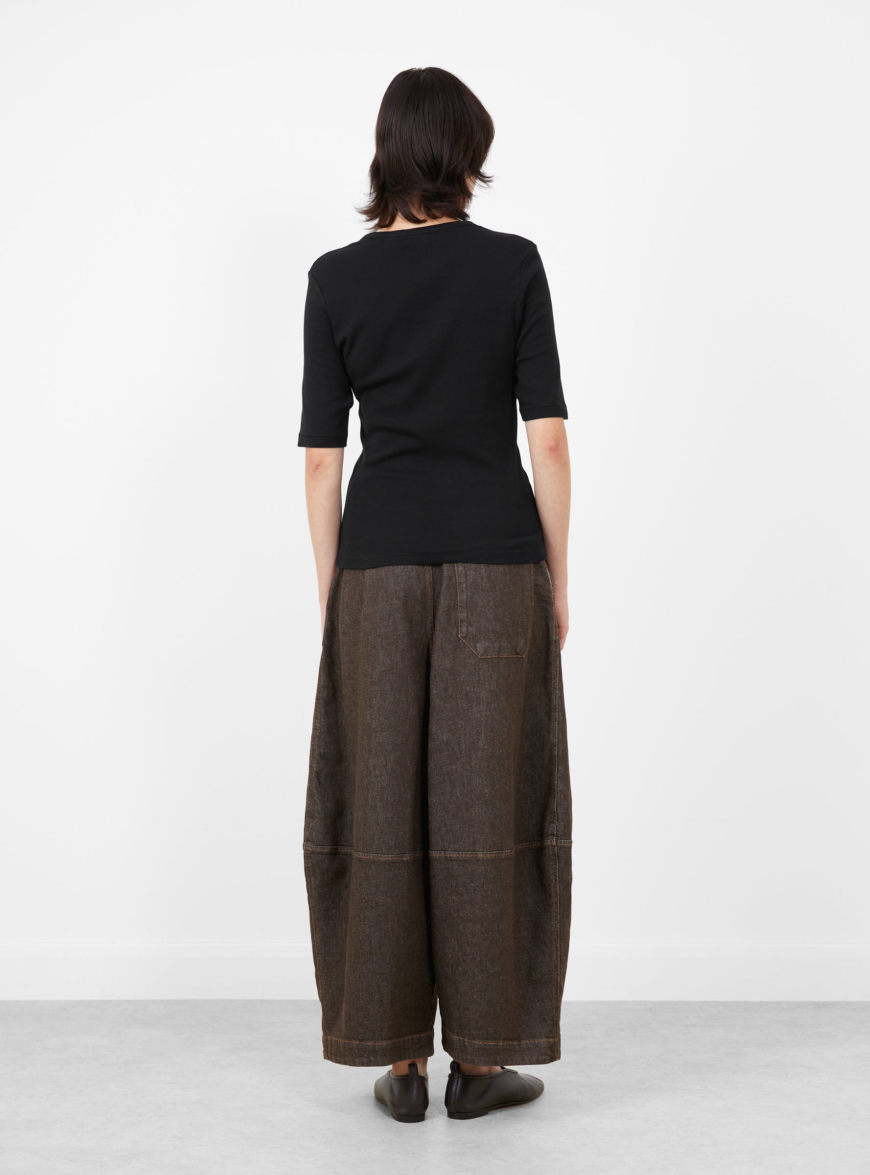 W_Charlotte_Short_Sleeve_Top_Black_Black_YMC_Model_Back at Couverture & The Garbstore