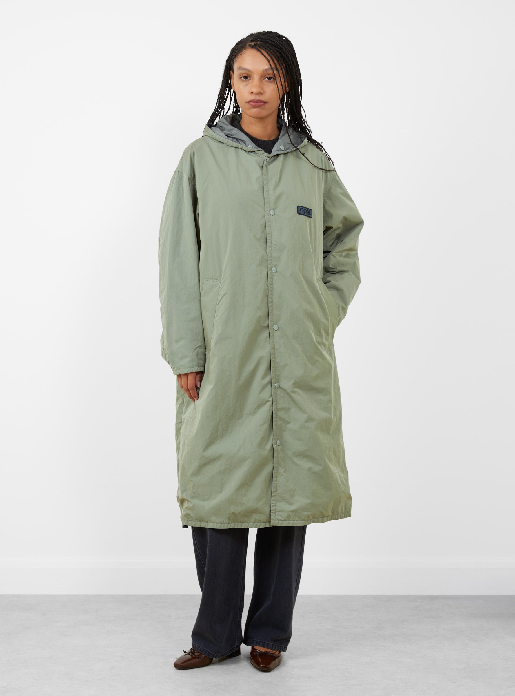 W Quilting Bench Coat Sage Green Sage Green Nanamica (model front) at Couverture & The Garbstore