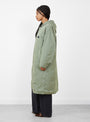 W Quilting Bench Coat Sage Green Sage Green Nanamica (model side) at Couverture & The Garbstore
