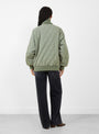 W Quilting Varsity Jacket Sage Green Sage Green Nanamica (model back) at Couverture & The Garbstore