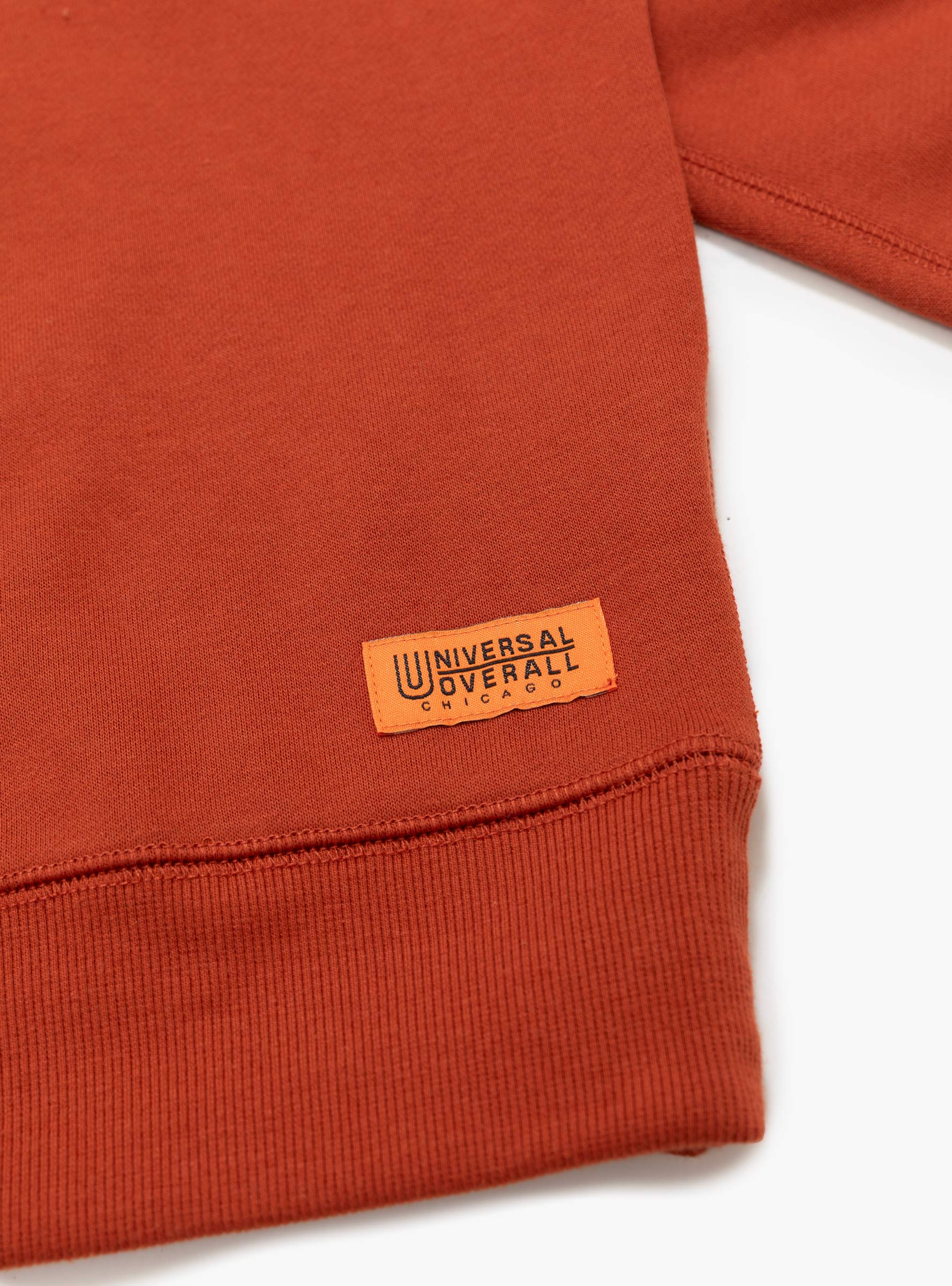 UO Logo Sweat Brick UNIVERSAL OVERALL (logo detail) at Couverture & The Garbstore