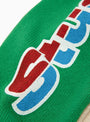 Two-Tone-Raglan-Sweater-Natural-Stussy-(print-detail) at Couverture & The Garbstore