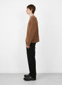 Merino-Wool-Neck-Sweater-Brown-Stussy-(model-side) at Couverture & The Garbstore