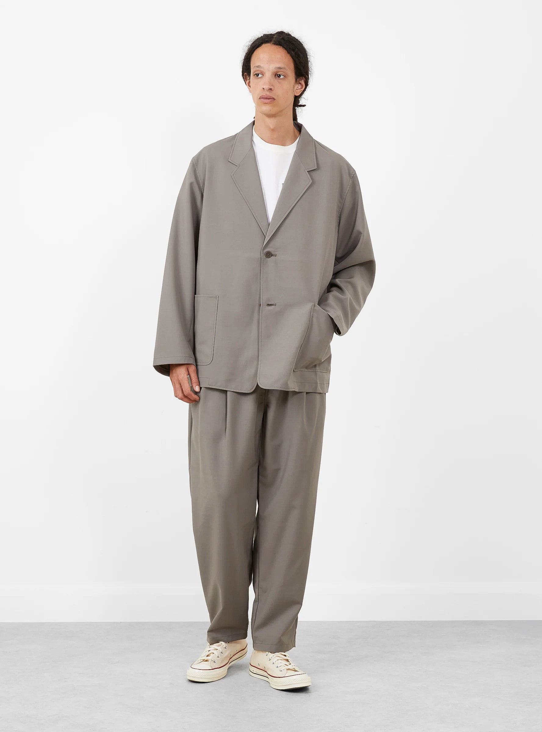 Relaxed 2 Pleat Pants Greige STILL BY HAND (model front) at Couverture & The Garbstore