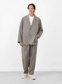 Relaxed 2 Pleat Pants Greige STILL BY HAND (model front) at Couverture & The Garbstore