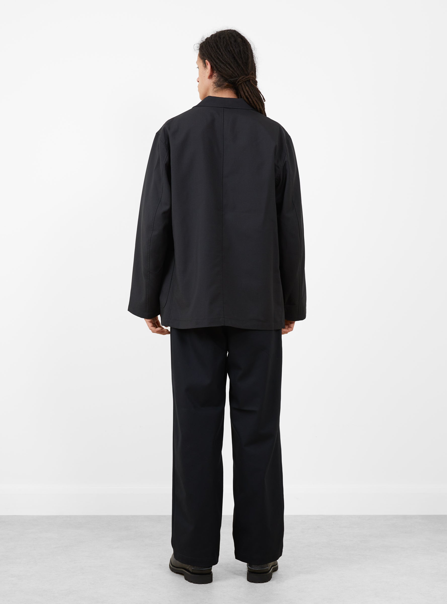 Relaxed 2 Pleat Pants Ink Black STILL BY HAND (model back) at Couverture & The Garbstore