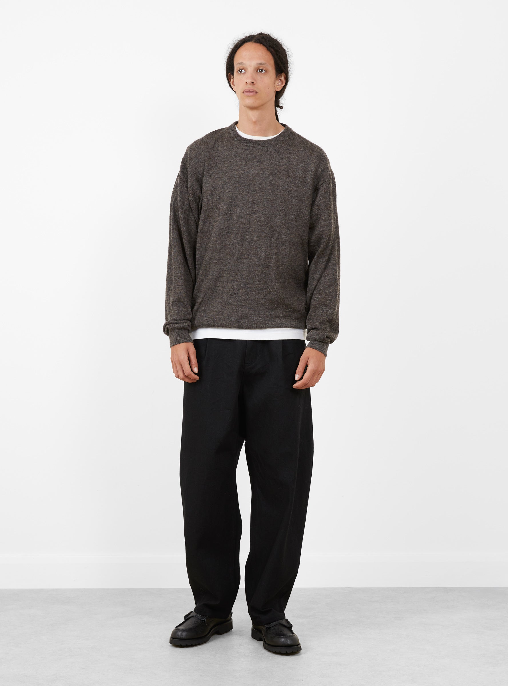12 Oz Deep Tuck Denim Pants Black STILL BY HAND (model front) at Couverture & The Garbstore