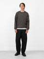 12 Oz Deep Tuck Denim Pants Black STILL BY HAND (model front) at Couverture & The Garbstore