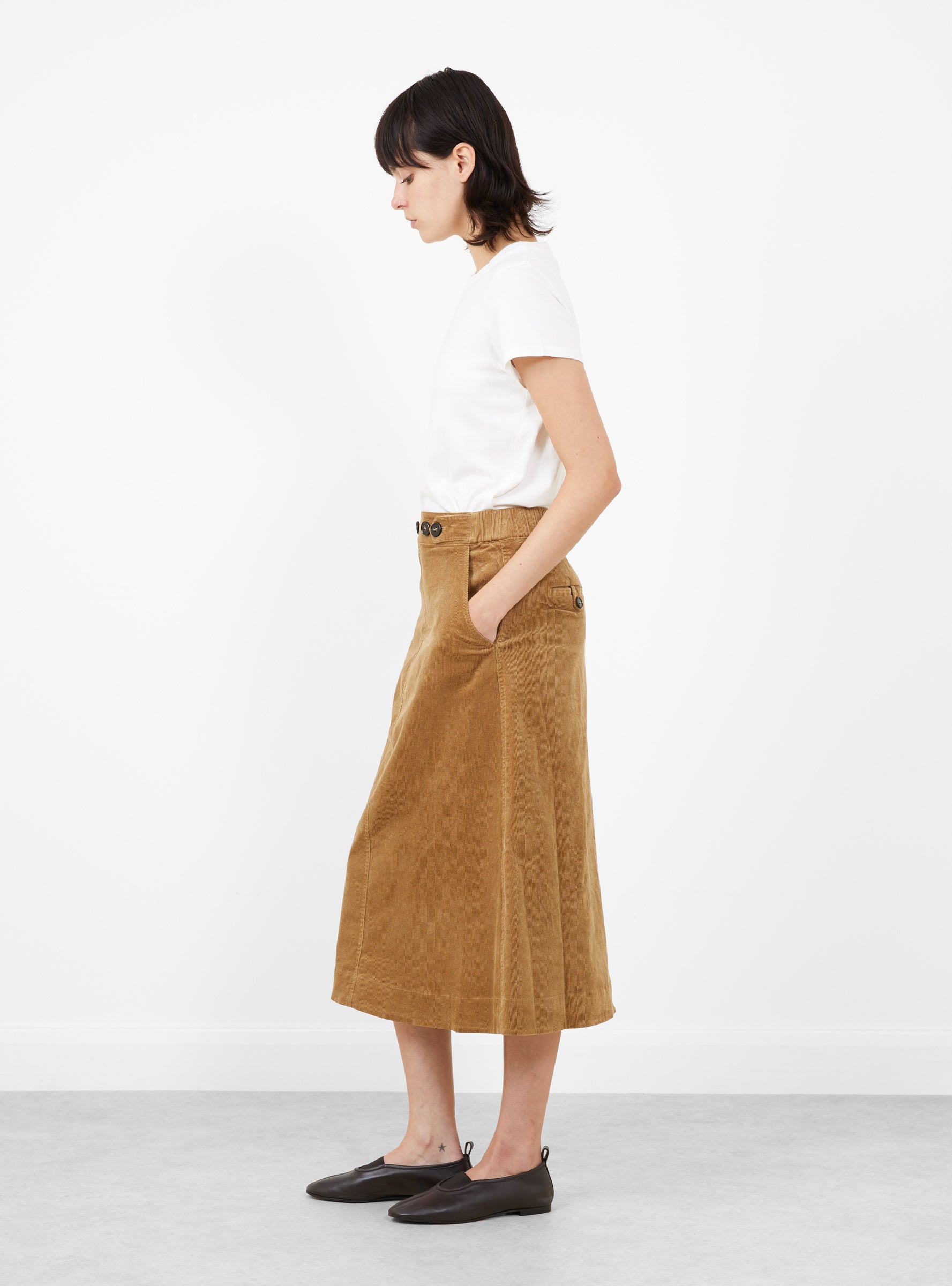 Garrett Corduroy Midi Skirt Khaki Khaki SEA (model side) at Couverture & The Garbstore
