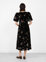 Leda Velvet Puff Sleeve Midi Dress Black Black SEA (model back) at Couverture & The Garbstore