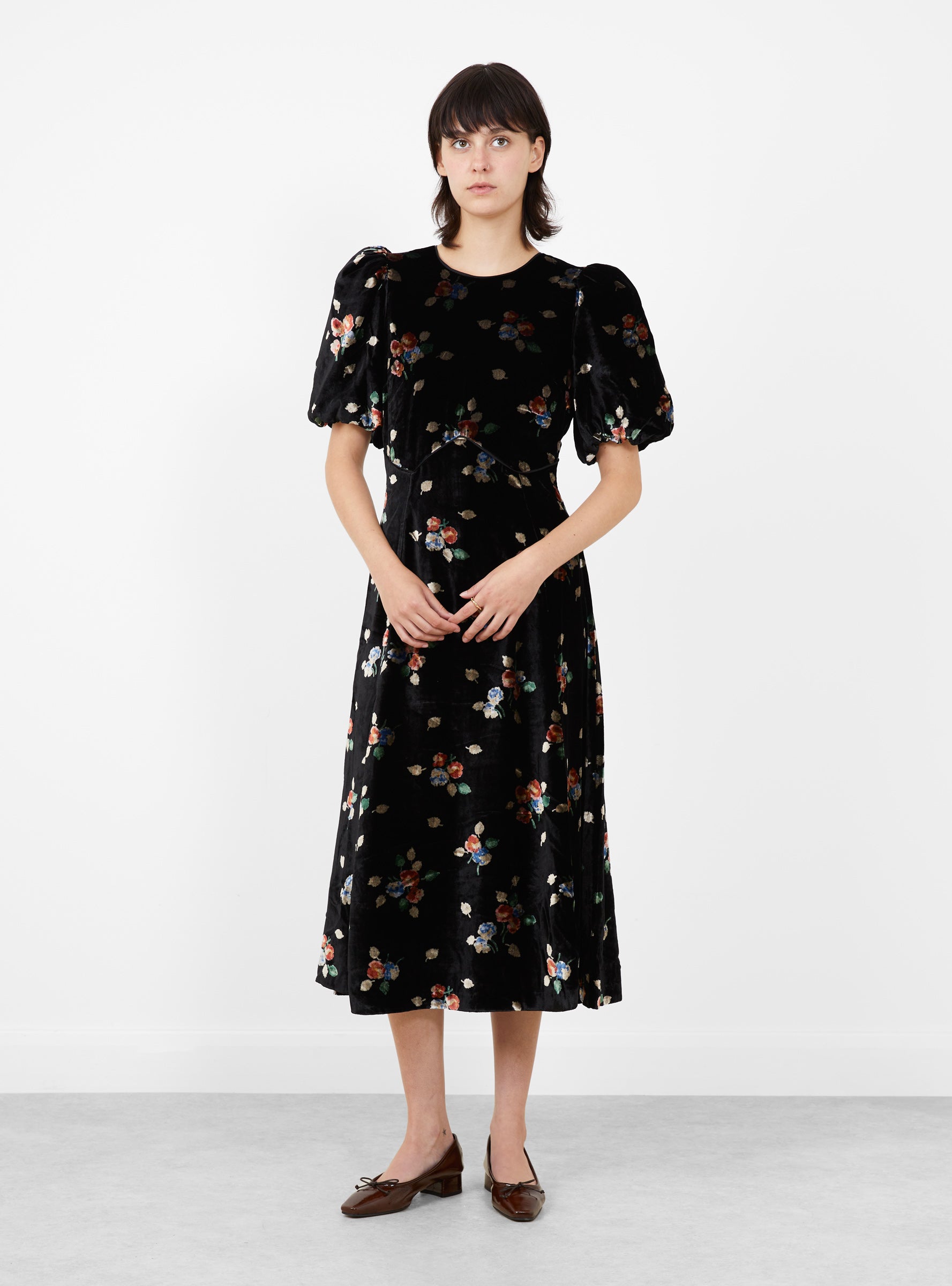 Leda Velvet Puff Sleeve Midi Dress Black Black SEA (model front) at Couverture & The Garbstore