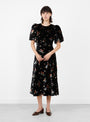 Leda Velvet Puff Sleeve Midi Dress Black Black SEA (model front) at Couverture & The Garbstore