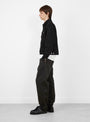 Trucker-Denim-Raw-Black-Stussy-(model-side) at Couverture & The Garbstore