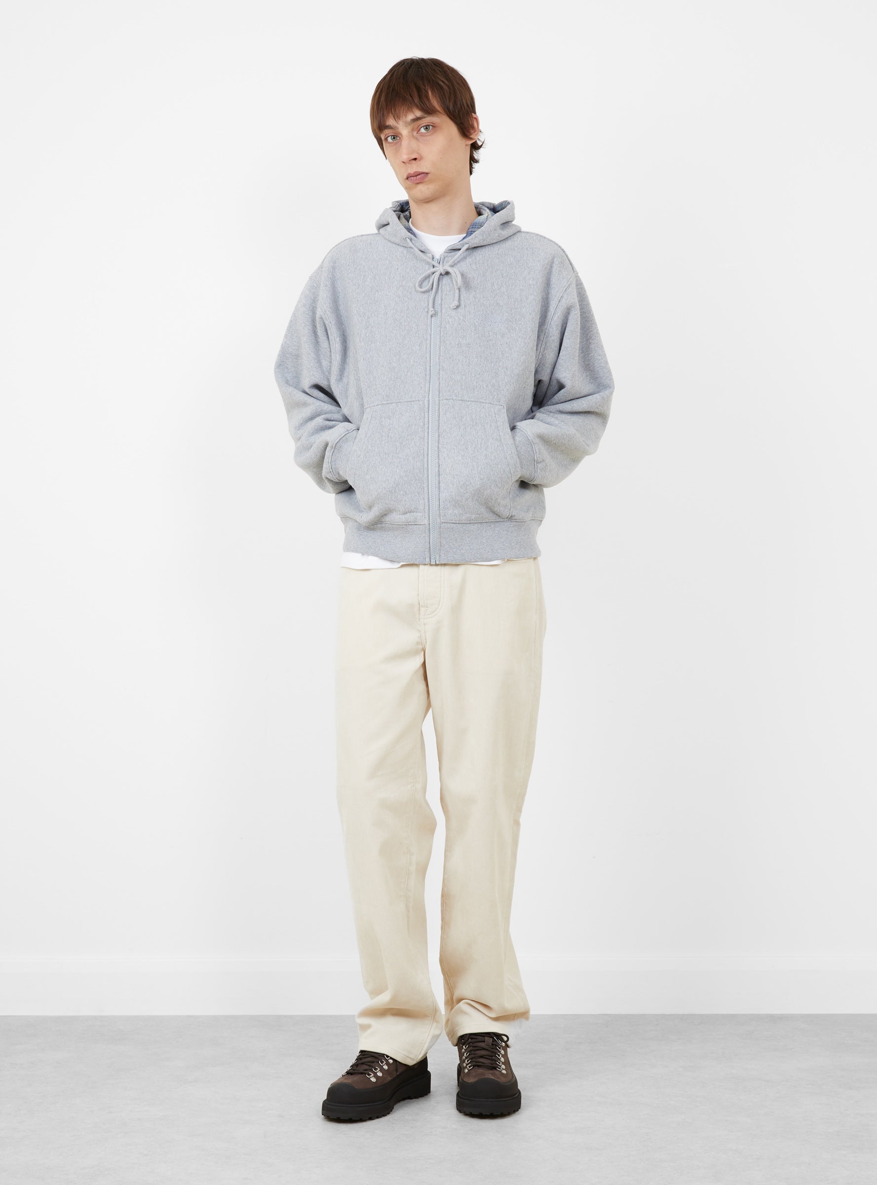 Plaid Lined Zip Hoodie Heather Grey Stussy (model front) at Couverture & The Garbstore