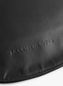 Soft-Crescent-Crossbody-Bag-Black-Black-Modern-Weaving-(logo-detail) at Couverture & The Garbstore