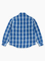 The Lau Plaid Shirt Jacket from Stüssy comes in Blue at Couverture & The Garbstore back
