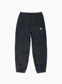 The Nylon Track Pant from Stüssy comes in Black at Couverture & The Garbstore
front 