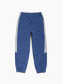 The Nylon Track Pant from Stüssy comes in Navy at Couverture & The Garbstore back 