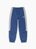 The Nylon Track Pant from Stüssy comes in Navy at Couverture & The Garbstore
front 