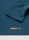 Micro Logo Long Sleeve T-Shirt Chrome Blue by AFFXWRKS | Couverture & The Garbstore